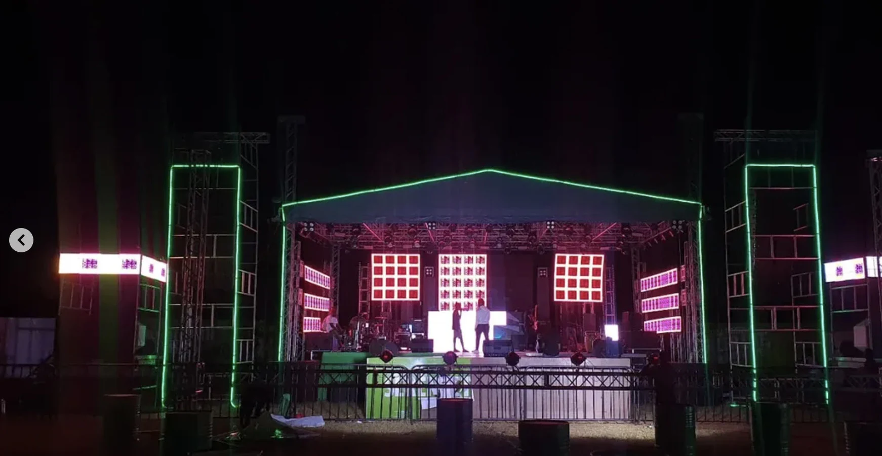 Event stage at night with illuminated LED displays